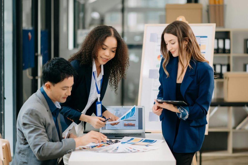 Creative business people working on business project in office